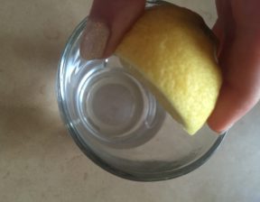 Lemon Squeezing into water